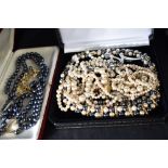 A selection of costume simulated pearl jewellery including brooch, necklaces, pendant, earrings etc