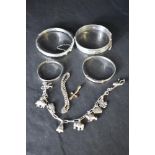 Two HM silver hinged bangles, two baby's silver Christening bangles, a child's silver bracelet and a