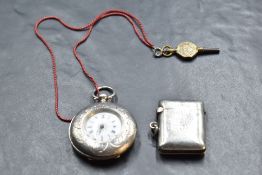 A small continental silver keywound pocket watch having Roman numeral dial with decorative face in