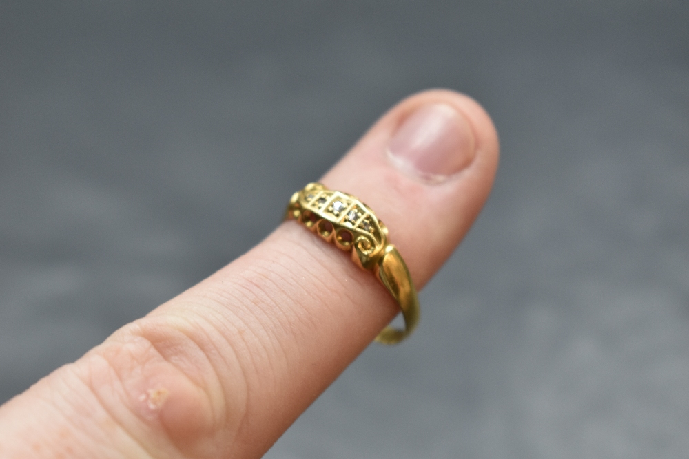 An Edwardian diamond chip set ring having a moulded mount on an 18ct gold loop, size T & approx 2. - Image 2 of 2