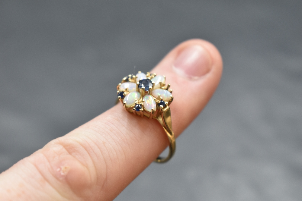 An opal and sapphire daisy cluster (missing a small sapphire) in a claw set basket mount on a 14ct - Image 2 of 2