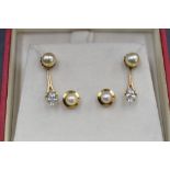 Two pairs of cultured pearl stud earrings, one pair stamped 9ct, one pair having detachable