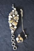 Three pieces of silver jewellery including an Artisan style multi stone split pearl and mineral
