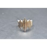 A Shaun Leane silver quill wrap ring inspred by the porcupine quill earrings designed by Leane for