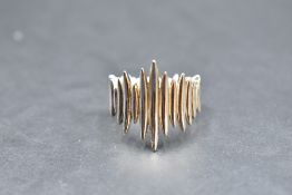 A Shaun Leane silver quill wrap ring inspred by the porcupine quill earrings designed by Leane for