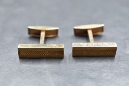 A pair of 9ct gold cufflinks of architectural form having bar connectors, approx 6.3g