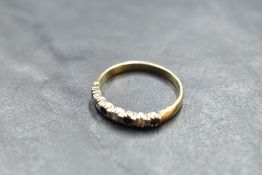 A diamond and sapphire half eternity ring on a 9ct gold loop, size Q & approx 2g