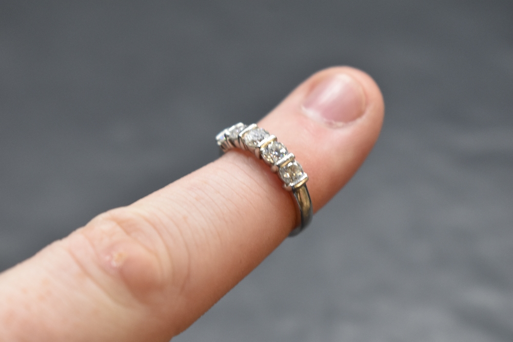 A five stone brilliant cut diamond eternity ring, approx 1.25ct in a bar set mount on a platinum - Image 2 of 2