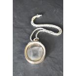 A Victorian Scottish silver pendant of plain oval form on a later silver chain, approx 20' & 61.5g