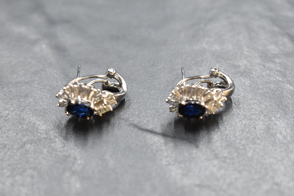 A pair of 18ct white gold sapphire and diamond earrings having oval sapphires, each approx 1.1ct - Image 2 of 2