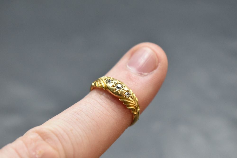 An Edwardian diamond chip set ring having a moulded mount on an 18ct gold loop, size L & approx 2. - Image 2 of 2