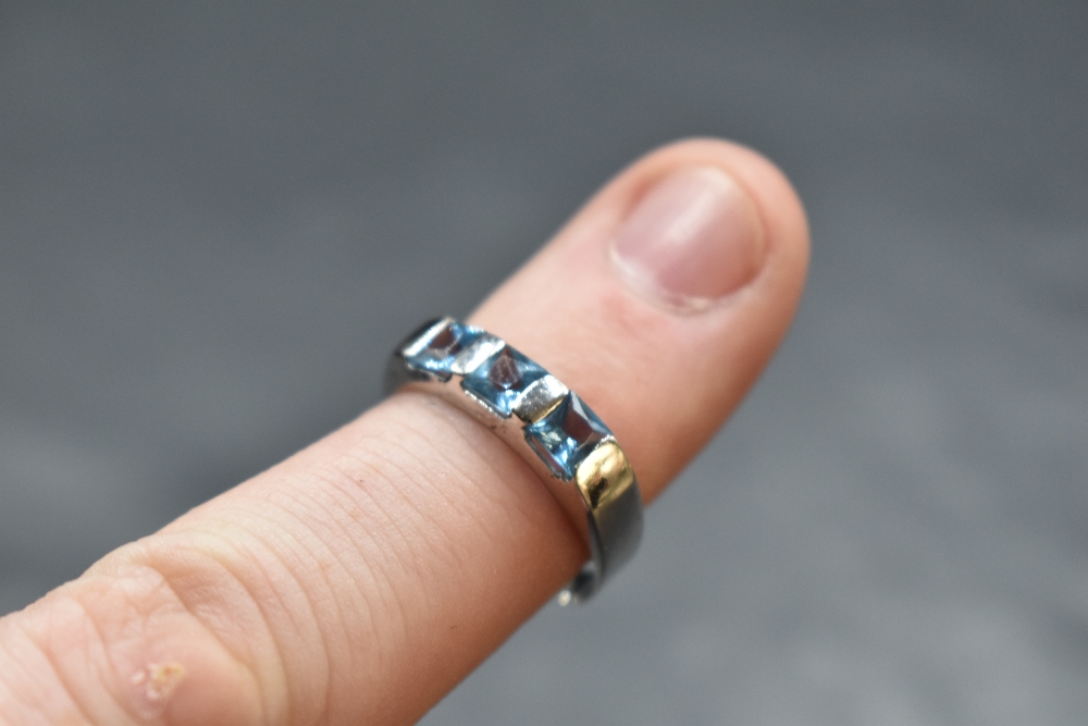 A three stone square cut blue topaz ring having bar settings on a white metal loop stamped C0-074, - Image 2 of 2