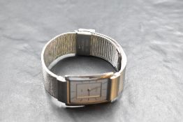 A gent's quartz wrist watch by Skagen, model: 224LSS having baton numeral dial to rectangular face