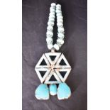 A Butler & Wilson 1970's statement necklace having turquoise style beads and stones, with original