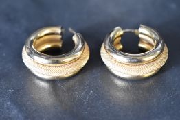 A pair of 9ct gold triple loop earrings for pierced ears, approx 7.5g