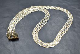 A 9ct tricolour gold plaited neacklace, approx 15' & 8.2g