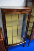 An early 20th Century stained frame display cabinet of small proportions