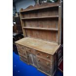 A 19th Century and later stripped pine dresser