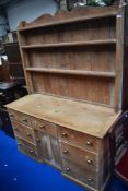 A 19th Century and later stripped pine dresser
