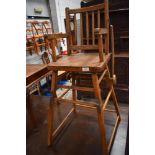 A vintage stained frame high chair