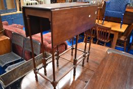 A 19th Century mahogany occasional table having fine turned gate legs, width approx. 69cm