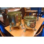 Two vintage brass planters, with lion mask handles and paw feet (not a pair)