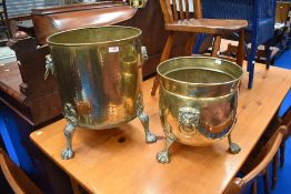 Two vintage brass planters, with lion mask handles and paw feet (not a pair)