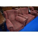 A 1930s design three piece lounge suite having later damask style upholstery