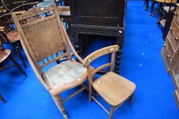 A 19th Century rocking chair having stripped frame