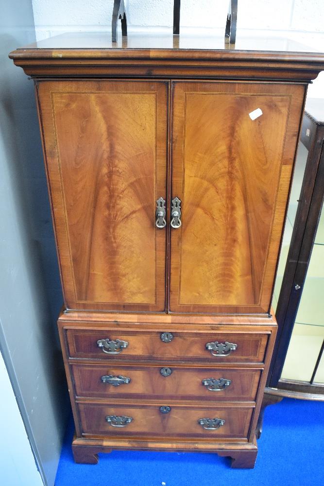 A reproduction Regency yew wood effect side cabinet, previously hifi could be repurposed for ,