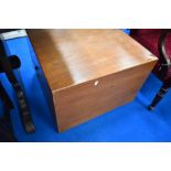 A 19th Century stained frame storage chest having lift lid and brass handles