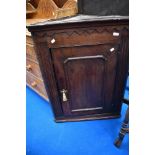 A 19th Century oak corner cupboard