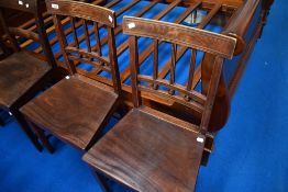 A pair of 19th Century solid seat dining chairs