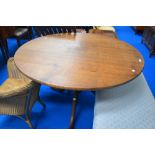 A nice quality reproduction George III style oak circular pedestal table, circular top on turned
