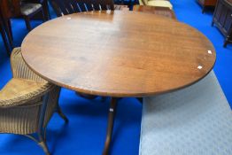 A nice quality reproduction George III style oak circular pedestal table, circular top on turned