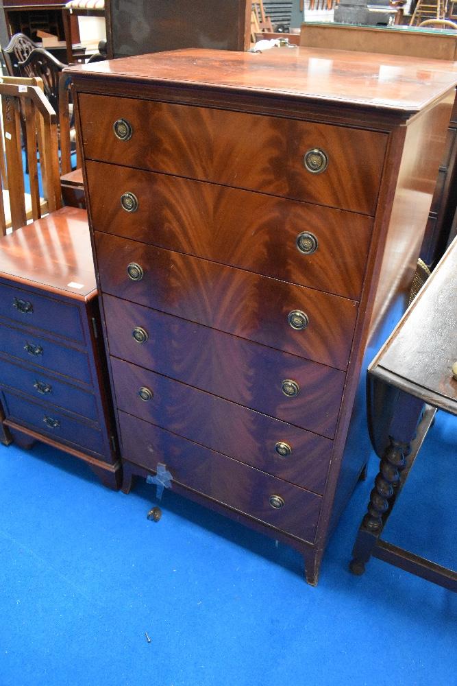 A reproduction regency style narrow chest of six drawers