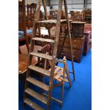 Two sets of traditional wooden steps (one tall & one short)