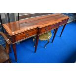 A good quality reproduction yew wood breakfront console table having square tapered legs and spade