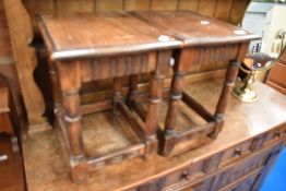A pair of Priory style occasional tables