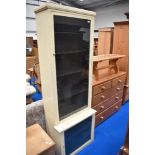 A vintage narrow painted display cabinet , possibly shop fitting