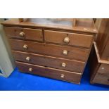 A Victorian stripped pine chest of two over three drawers