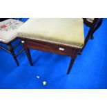 Am Edwardian mahogany piano stool having dralon seat and inlaid decoration on square tapered legs