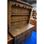 A reproduction oak dresser in the Titchmarsh and Goodwin style, of nice quality and proportions
