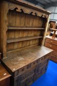 A reproduction oak dresser in the Titchmarsh and Goodwin style, of nice quality and proportions