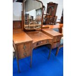 A 19th Century mahogany dressing table having large brass handles and inlaid decoration, width