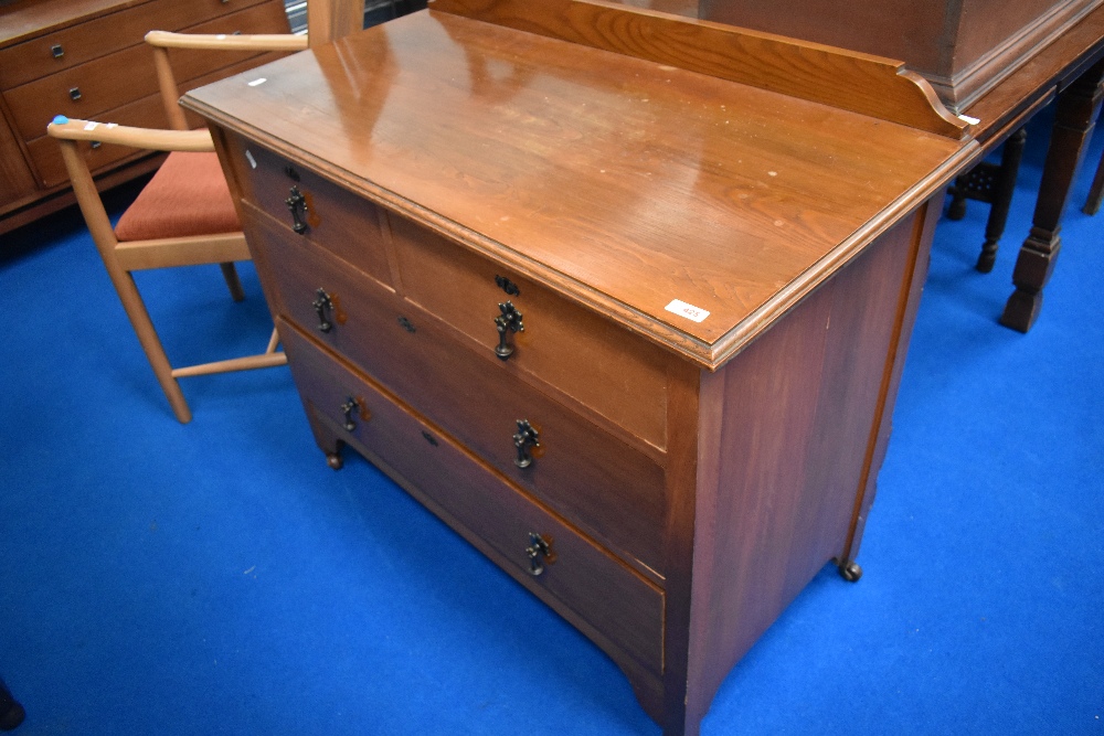 An early 20th Century golden oak bedroom chest of two over two drawers