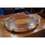 An Edwardian oval tray with plated gallery and handles