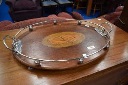 An Edwardian oval tray with plated gallery and handles