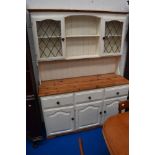 A part pine and painted kitchen dresser in the traditional style