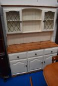 A part pine and painted kitchen dresser in the traditional style